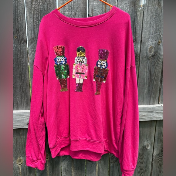 Women’s pink sweatshirt with nutcrackers. - Picture 1 of 5